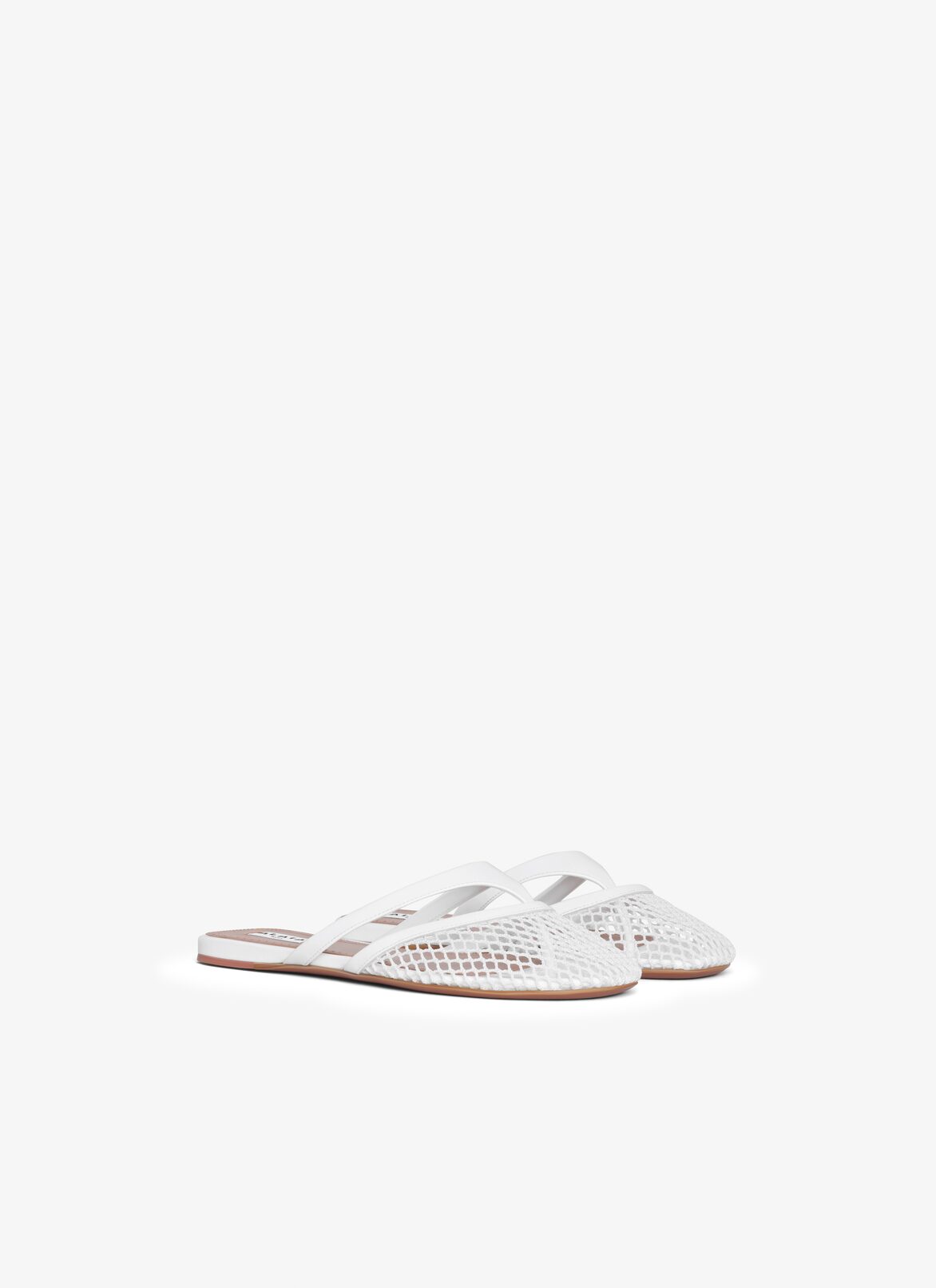 INFRADITO FLAT MULES IN FISHNET AND LEATHER ALAÏA OPTIC WHITE INFRADITO FLAT MULES IN FISHNET AND LEATHER